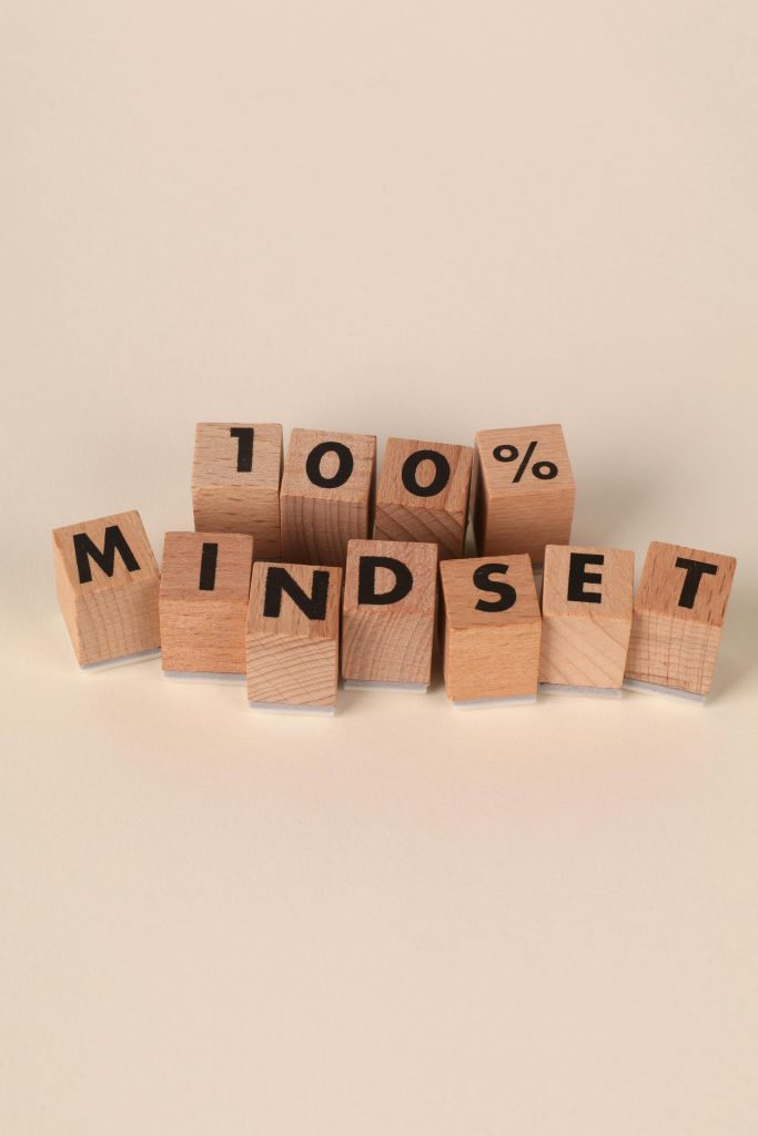 pexels photo 33090270 33090270 Wooden blocks spelling '100% MINDSET' symbolizing motivation and positive thinking.
